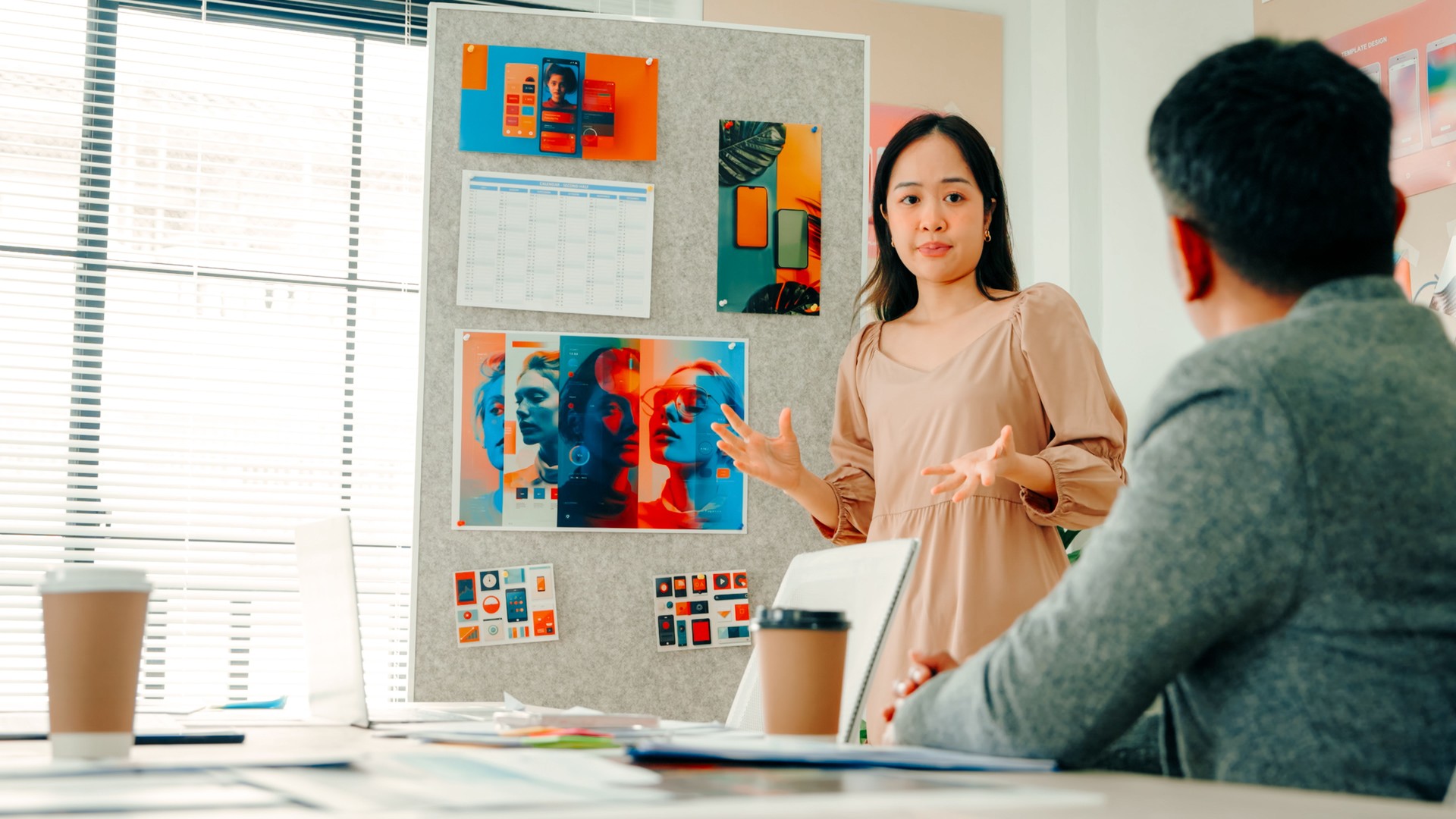UX designer designer Team Planning and Discussing Business Ideas for a New Campaign in a Corporate Setting
